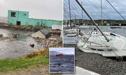 Houses are WASHED away and yachts beached as storm Fiona slams into Nova Scotia: Record low pressure brings winds of 111mph and huge storm surges - as residents are told to stay at home
