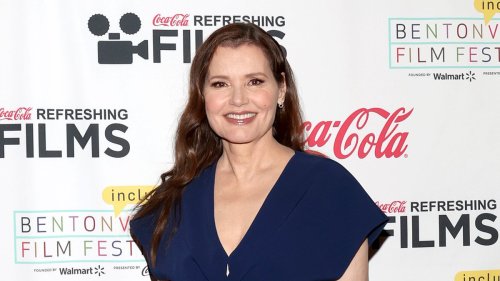 Geena Davis, 68, puts on a leggy display in thigh-split navy dress as she hits the red carpet for...