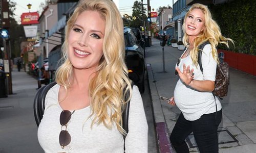 Heidi Montag shows off her growing baby bump in a white T-shirt while leaving Giorgio Baldi in Santa Monica