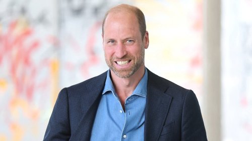 Prince William shows off his football skills as he announces exciting new collaboration on visit to community centre in Scotland