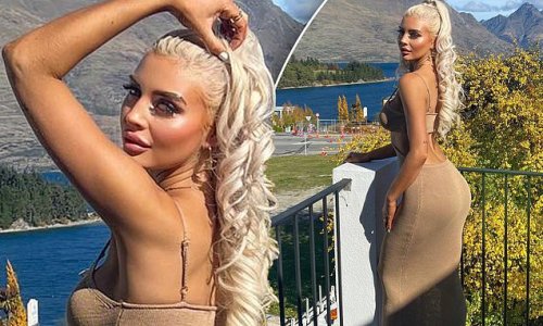 What a view! Too Hot To Handle's Larissa Trownson flaunts her curves in a brown cut-out dress as she poses on her hotel balcony in Queenstown