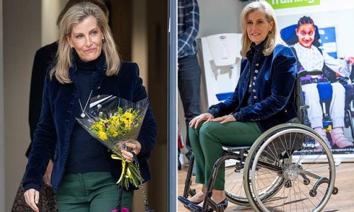 Sophie Wessex looks elegant in a velvet blazer as she tries out a wheelchair on visit to Guildford charity supporting disabled children