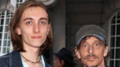 Mackenzie Crook, 52, is dwarfed by lookalike son Jude, 21, as they make a rare public appearance at...