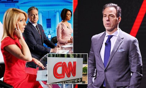 Jake Tapper tests positive for COVID at network's D.C. bureau but STAYS to film his show discussing America's millionth death from the virus - leaving coworkers furious