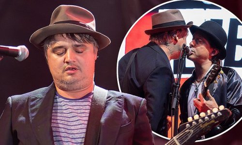 Pete Doherty takes to the stage to perform with the Libertines at Castlefield Bowl in Manchester - after embracing clean-living