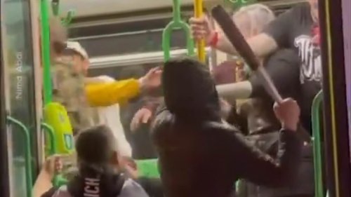 Melbourne tram brawl: Passengers punched and threatened with a baseball bat after attending Good...