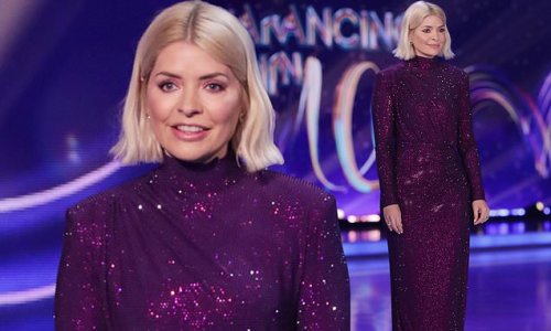 Holly Willoughby shows off her frame in glittering purple maxi dress