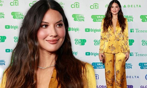 Olivia Munn looks gorgeous in silky gold pant suit at Vax Live in LA