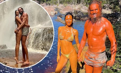 Victoria's Secret Angel Lais Ribeiro sports a striped bikini as she and new husband Joakim Noah enjoy a clay bath on honeymoon in Brazil