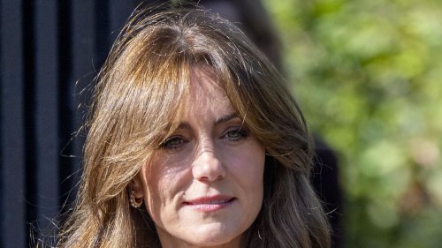 Kate Middleton has added voluminous 70s bangs to her hair to and 'draw attention to her cheekbones'...