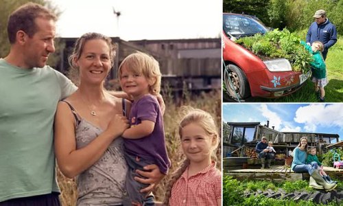 EXCLUSIVE: Couple who quit jobs as vets to move to rural Wales and live off-grid are facing financial ruin after neighbours 'bought access lane to their zero carbon eco-farm and are threatening to sue them for trespass'