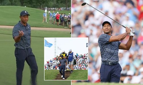 'Back off': Tiger Woods snaps at a cameraman at the PGA Championship as he tells them to give him 'breathing space' before shrugging it off to make birdie on his first hole of the opening round at Southern Hills
