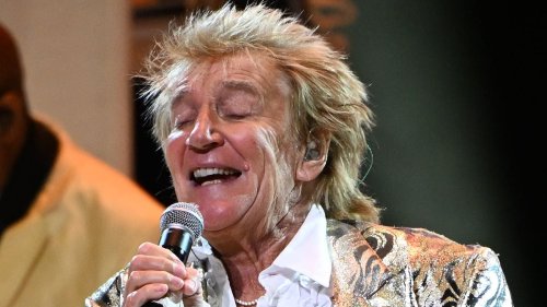 Sir Rod Stewart, 80, is 'escorted to his car by minders' following boozy night out at a bar in Poland