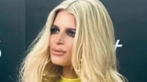 Jessica Simpson, 43, looks ultra svelte in a sparkly yellow dress at Dolly Parton's Pet Gala - as...