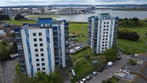 Tower block where residents throw their food waste straight out of their flat windows is hit by massive rat invasion