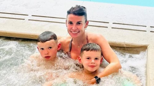 Bikini-clad Coleen Rooney gives an insight into her family holiday as husband Wayne proudly displays his son's very accurate portrait of him