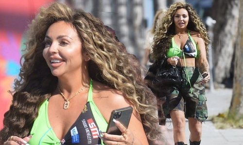 Jesy Nelson puts on a busty display in green crop top and camo shorts