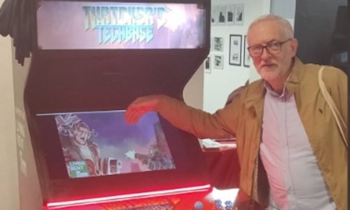 Former Labour leader Jeremy Corbyn pictured playing arcade game about killing a zombie MARGARET THATCHER that labels her 'one of humanity's greatest threats' at hard Left party conference fringe event