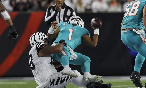 Dolphins QB Tua Tagovailoa is in 'good spirits' after being released from a Cincinnati hospital and flying back to Miami 'in a neck brace' following his concussion in Thursday's loss
