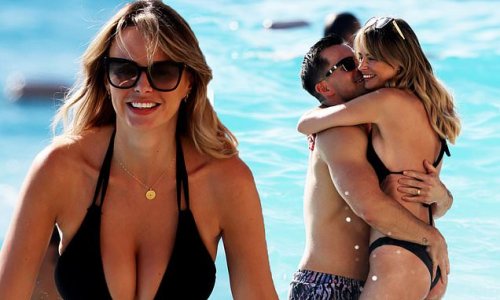 Rhian Sugden Exposes Her Ample Assets In A Black Bikini As She