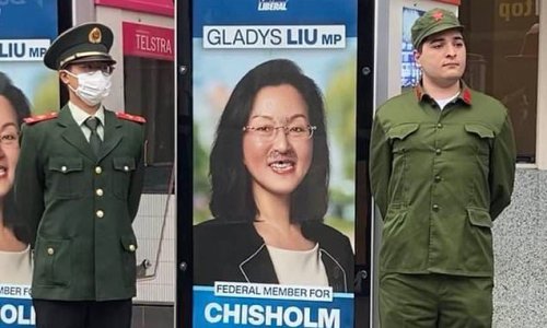 Why two 'Chinese Red Guards' were pictured standing next to a defaced election sign for Chinese-Australian Liberal MP Gladys Liu in Melbourne