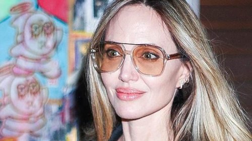 Angelina Jolie looks chic in a sheer black dress and heels as she visits her Atelier shop in NYC