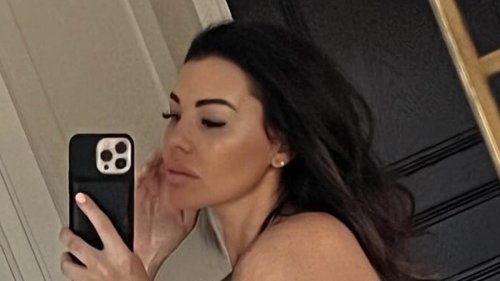 Jess Wright showcases her incredible figure as she poses topless in sizzling bedroom snap