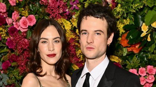 Braless Alexa Chung wows in a netted gold dress as she joins her rumoured fiancé Tom Sturridge at...