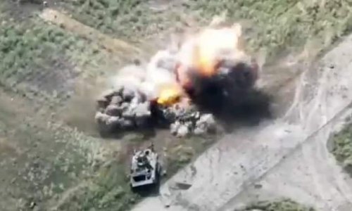 Putin's army puts more inept tactics on display: Moment Russian armoured vehicle driver speeds past two of his comrades' wrecked BMPs and STRAIGHT into a mine blowing his own vehicle to smithereens