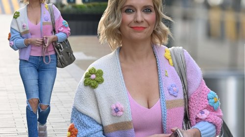 Rachel Riley rocks a colourful knit cardigan and distressed jeans as she steps out in the Manchester sunshine