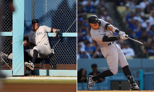 A captain's sacrifice! Aaron Judge crashes into Dodger Stadium's bullpen door for brilliant sprinting catch before hitting a home run in the Yankees' 6-3 win over LA
