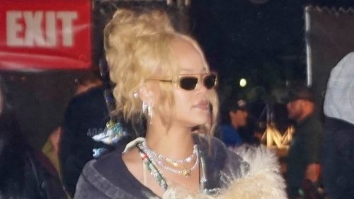 Rihanna brings her unique sense of style to Coachella wearing a quirky fur coat and thigh high boots...