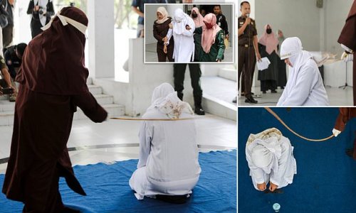 Caned and shamed... for making out in a parked car: Unmarried couple are publicly whipped 21 times each for breaking Sharia law in Indonesia's Aceh district