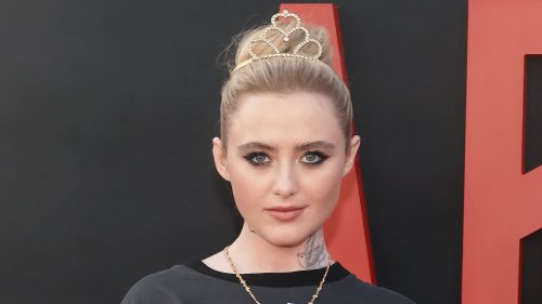 Kathryn Newton channels edgy punk rock look with fake tattoos as she joins a glamorous Melissa...