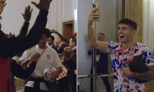 USA players are cheered as they arrive back at their team hotel in Qatar after advancing to the knockout stage of the World Cup... and hurt Christian Pulisic is there to congratulate them after getting out of hospital!