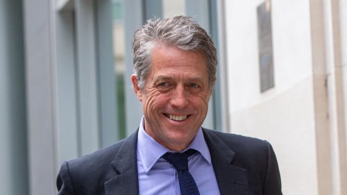 Hugh Grant settles High Court claim against the publisher of The Sun for 'an enormous sum of money'