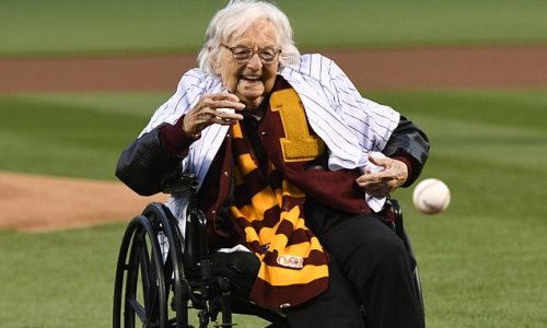 'Faith restored in humanity': Loyola Chicago's 103-YEAR-OLD Sister Jean throws the first pitch at the Cubs-Phillies game at Wrigley Field
