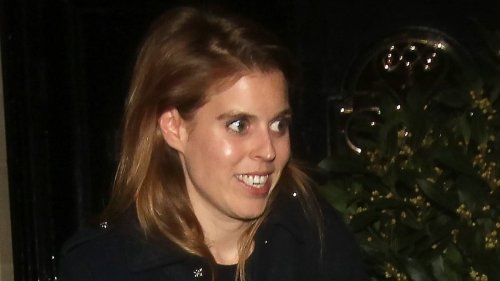 Princess Beatrice looks elegant in navy and burgundy while dining out with friends at celebrity...