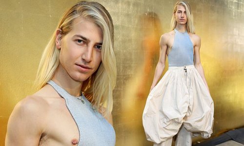 Christian Wilkins shows off bulging biceps while modelling a skirt