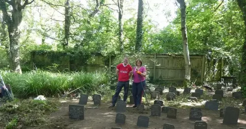 Volunteers give pet graveyard a facelift