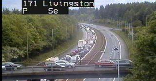 One vehicle crash in which car 'rolled over 10 times' closes both lanes of M8