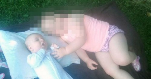 First picture of baby stabbed to death while toddler fights for life