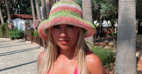 Paige Turley poses in hot pink bikini as she soaks up sun on Cyprus holiday