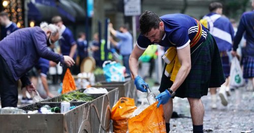 Tartan Army pick up litter at Leicester Square after laying siege to London