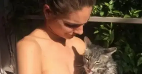 Neighbours beauty stripped totally naked with cat for Free The Nipple campaign