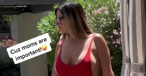Proud cougar gives fans 'Baywatch vibes' as she flaunts side-boob in swimsuit