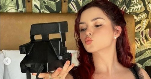 Demi Rose nearly bursts out of sheer skintight corset in eye-popping