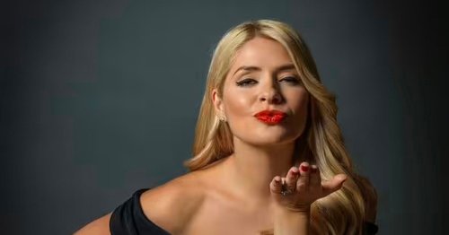 Holly Willoughby shows off famous curves in plunging dress in throwback snaps