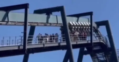 Theme park horror as thrillseekers stranded at top of 164ft roller coaster after 'technical fault'