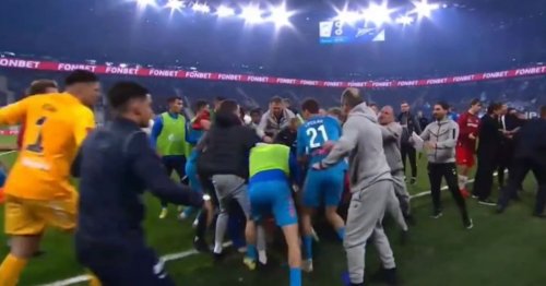Chaotic 65-man brawl sees Russian footballers kick, punch and fight on the floor